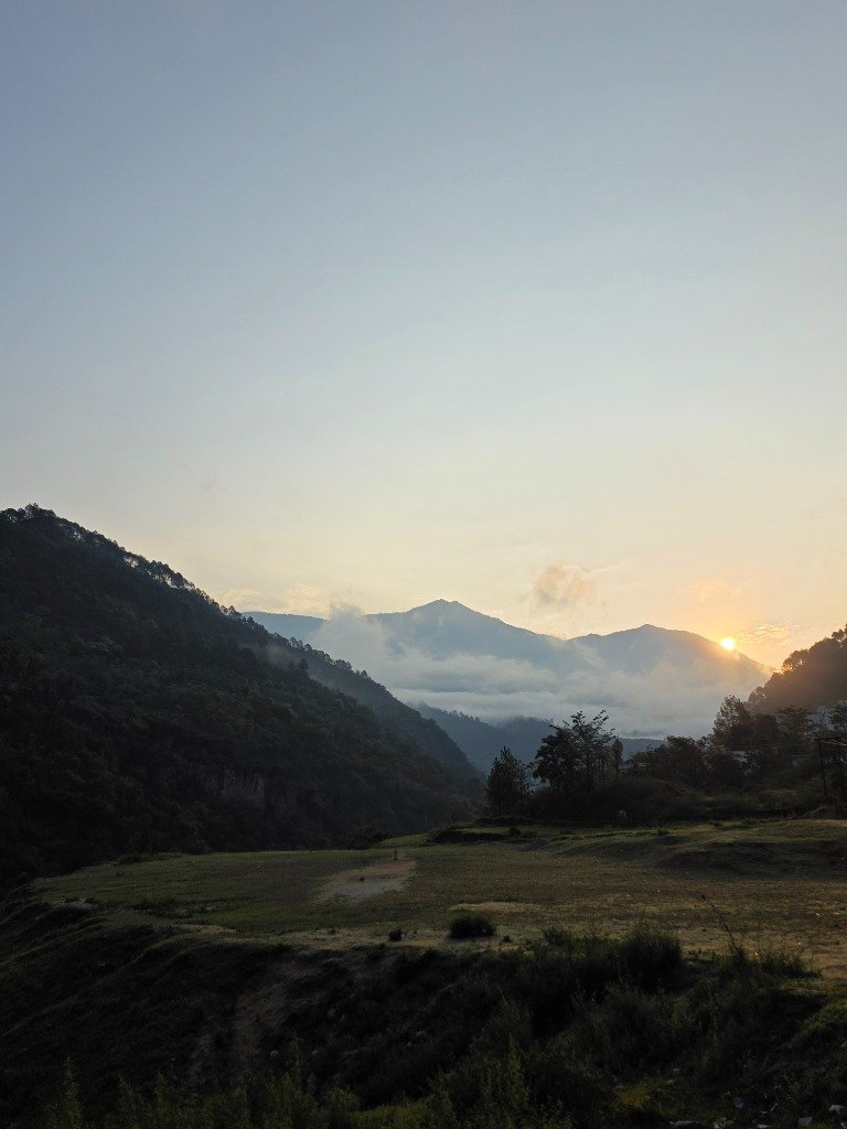 Beautiful golden hour sunset over distant mountain ranges